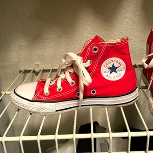 Kids red high top converse sneakers